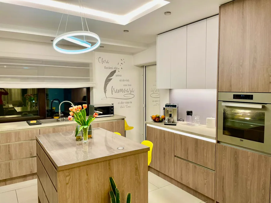 Modern kitchen with island and DeLonghi coffee machine